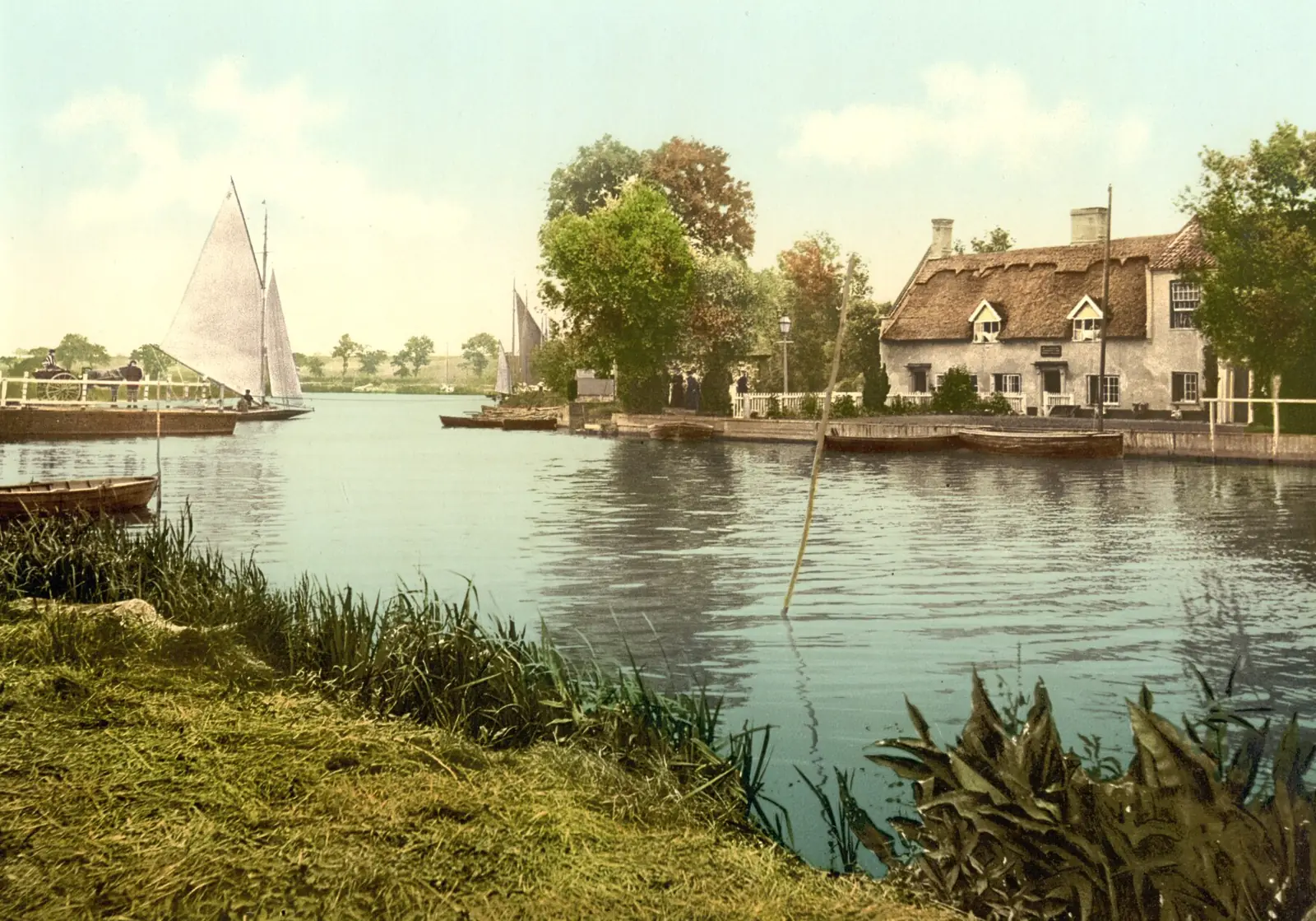 The ferry at Horning, Norfolk, around 1895: a thatched inn on the water with sailing boats